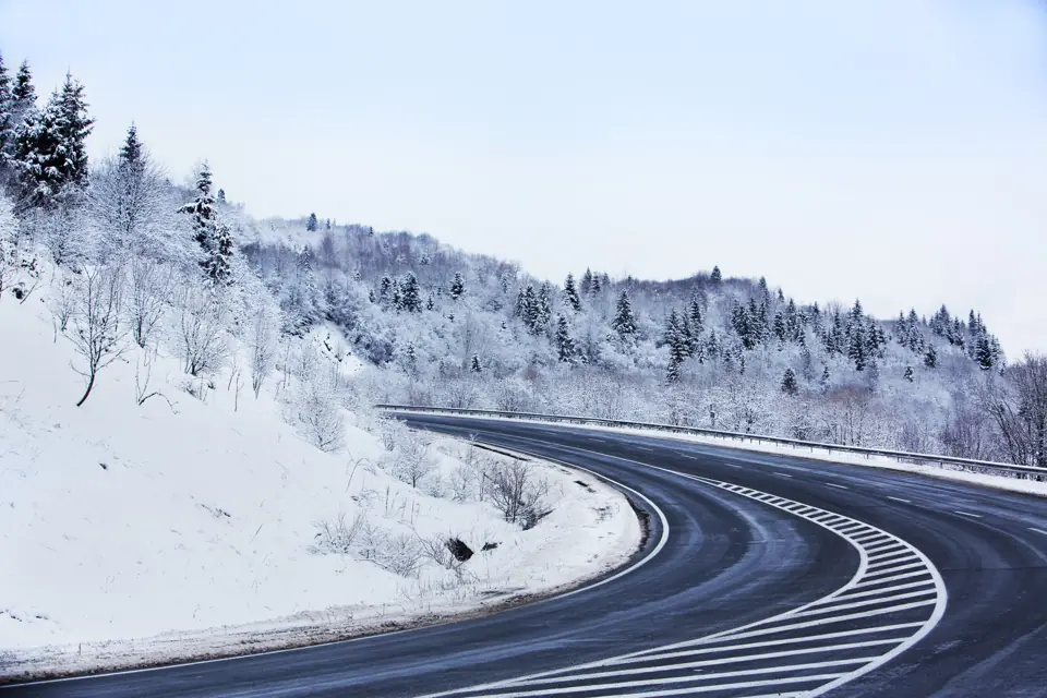 Winter mountain road, snow, chains