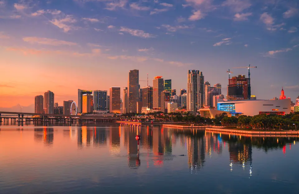 Miami, Florida skyline reflected in Biscayne Bay at sunrise